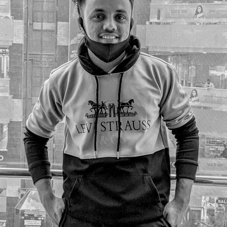 Kai Kapoor, Client Relations Director, discussing corporate gifting strategy with business clients